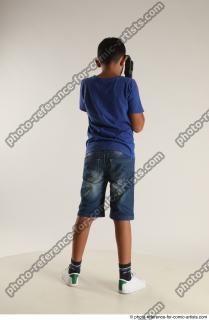 TIMBO STANDING POSE WITH GUN